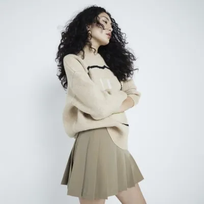 Khaki Pleated Mini Skort sold by River Island