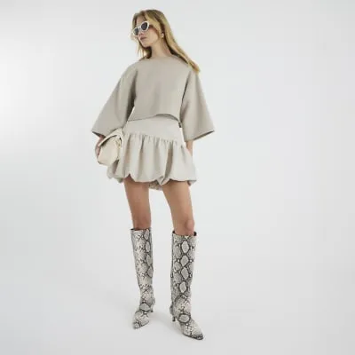 Cream Bubble Hem Mini Skirt sold by River Island