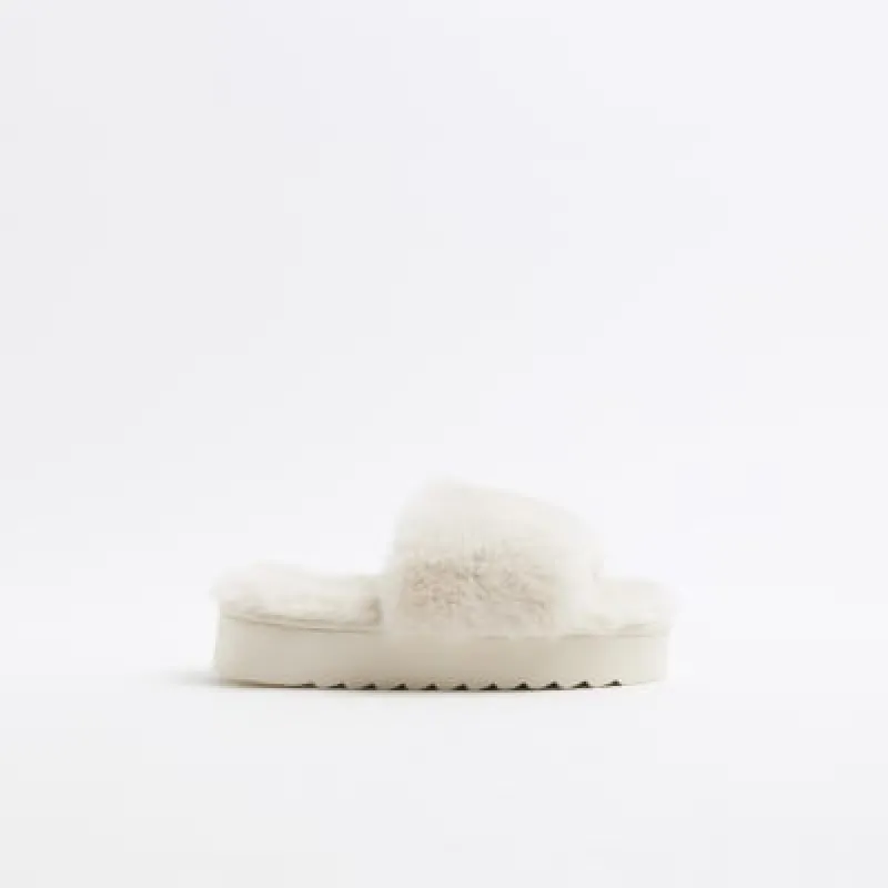 Cream faux fur open toe platform slippers sold by River Island