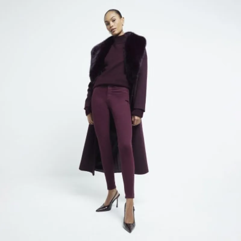 Red Mid Rise Molly Skinny Jeans sold by River Island