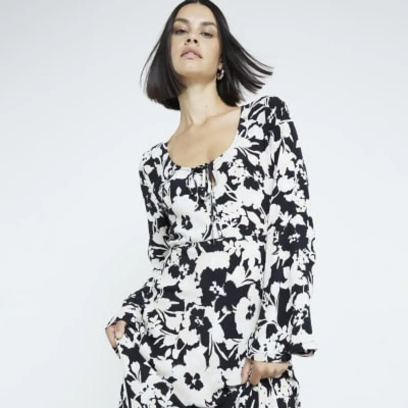 Black Floral long sleeve Midi Dress sold by River Island