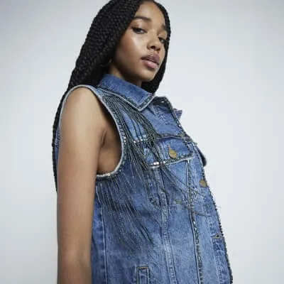 Denim Fringed Sleeveless Jacket sold by River Island