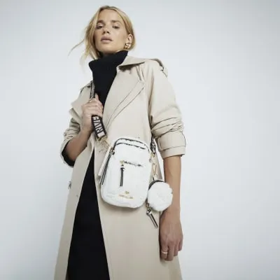 Cream Borg Quilted Cross Body Bag sold by River Island