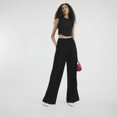 Black Soft Elastic Back Wide Leg Trousers sold by River Island