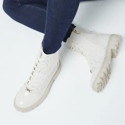 Cream Patent Lace Up Boots sold by River Island