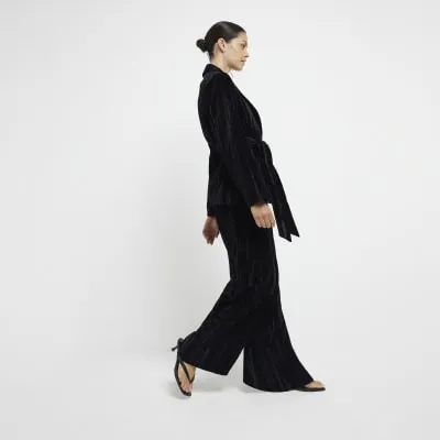 Black Velvet Wide Leg Trousers sold by River Island