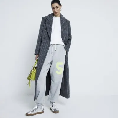 Grey Cuffed Graphic Joggers sold by River Island