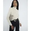 Cream Glitter Roll Neck Top sold by River Island