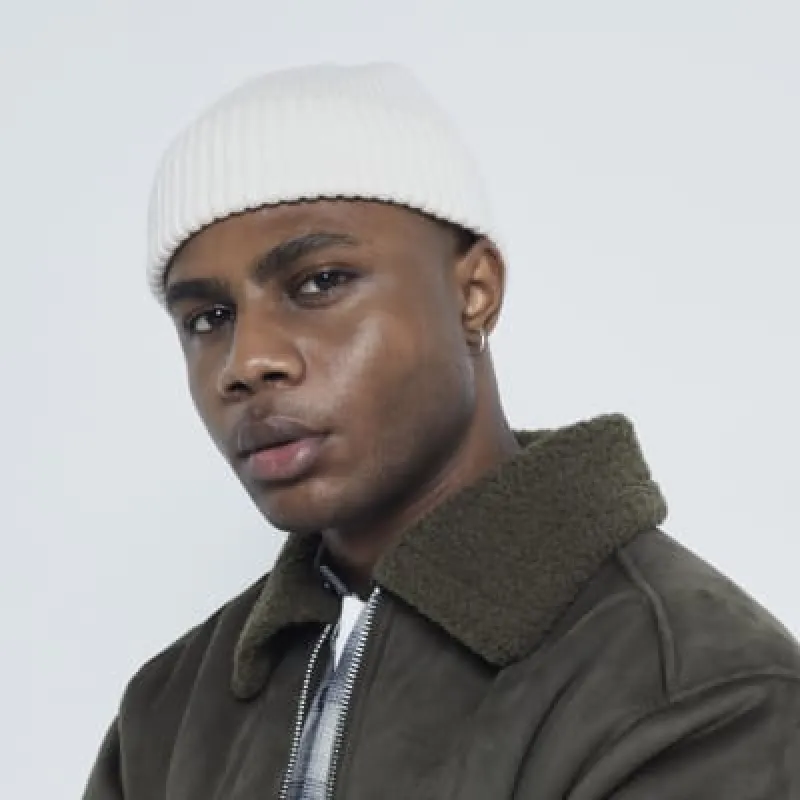 Ecru knitted Docker beanie sold by River Island