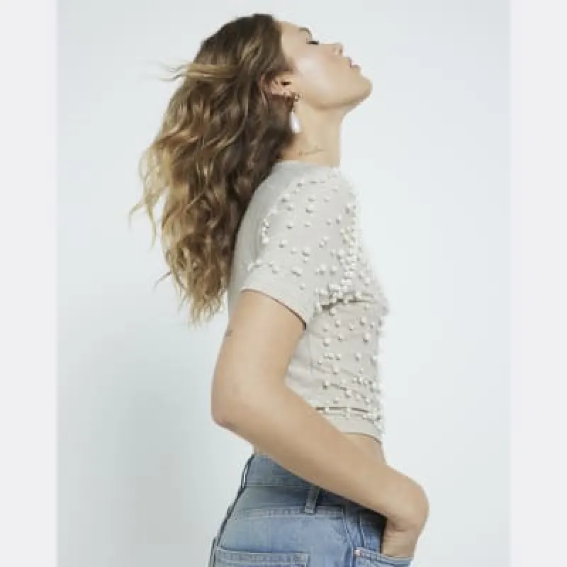Gold Short Sleeve Pearl Top sold by River Island