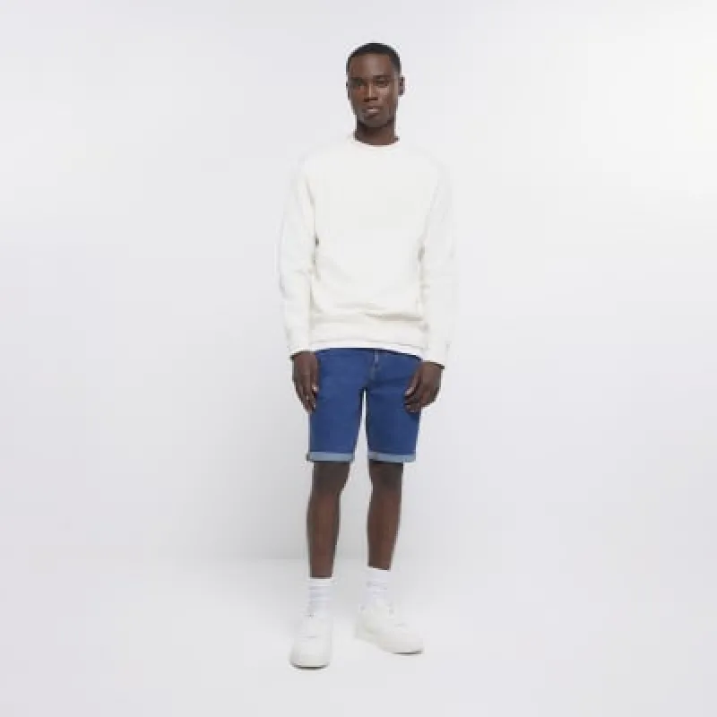 Blue skinny fit denim shorts sold by River Island