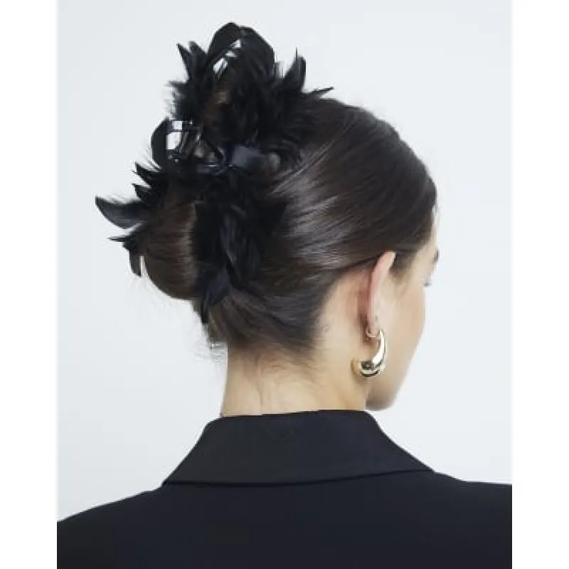 Black Feather Claw Clip sold by River Island