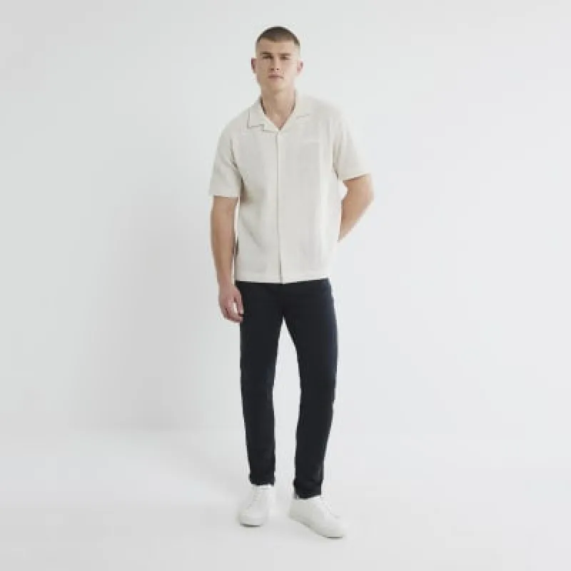 Black Skinny Fit Trousers sold by River Island