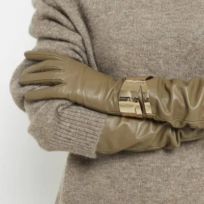 Gold Cross Over Cuff Bracelet sold by River Island