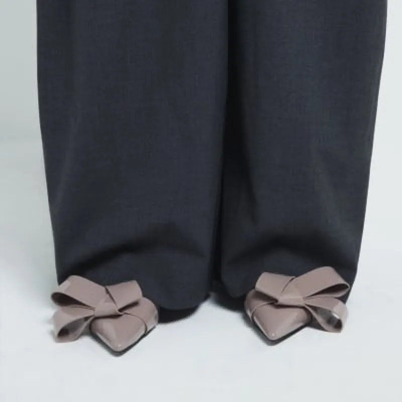 Pink structured bow detail court heels sold by River Island