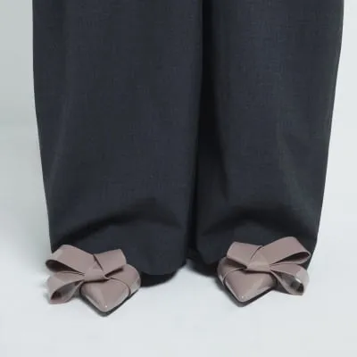 Pink structured bow detail court heels sold by River Island