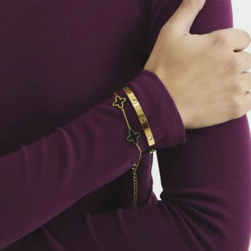 Pack of 2 Gold Bangle Clover Bracelets sold by River Island