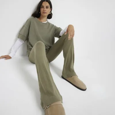 Khaki ribbed flared leggings sold by River Island