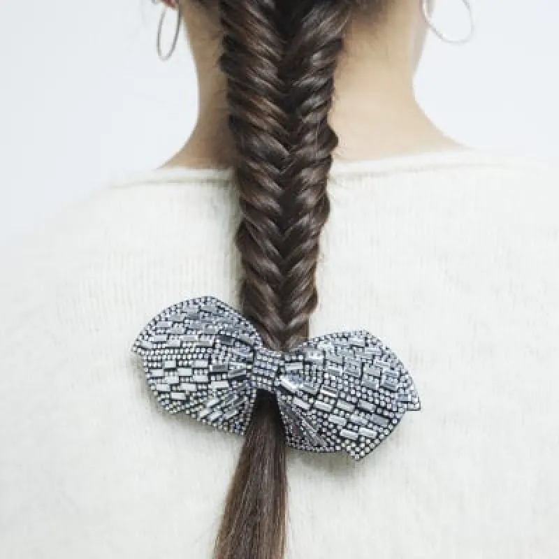 Silver Rhinestone Bow Hair Clip sold by River Island
