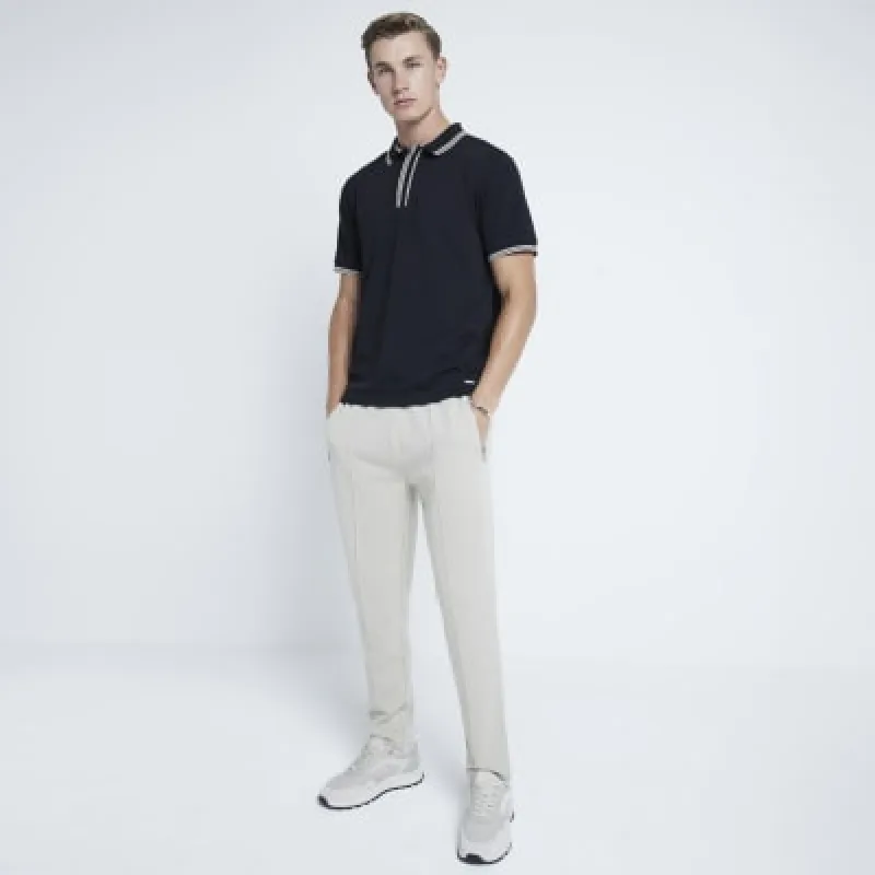 Black Slim fit textured tipped polo shirt sold by River Island