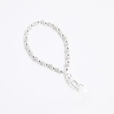 Silver Diamante Phone Charm sold by River Island