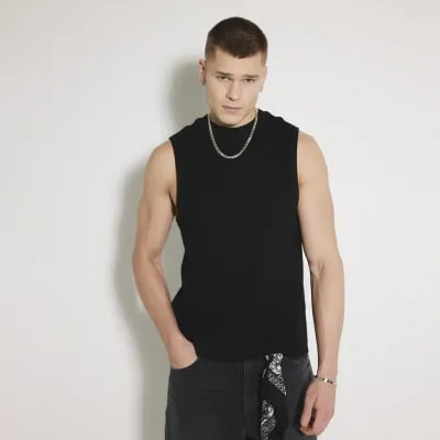 Black Regular Fit Ribbed Tank Top sold by River Island