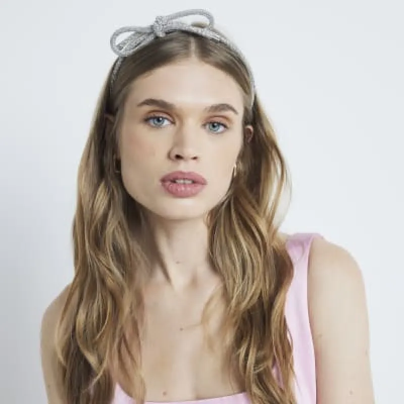 Silver Xmas Bow Headband sold by River Island