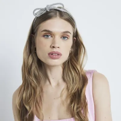 Silver Xmas Bow Headband sold by River Island