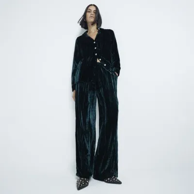 Green Velvet Wide Leg Trousers sold by River Island