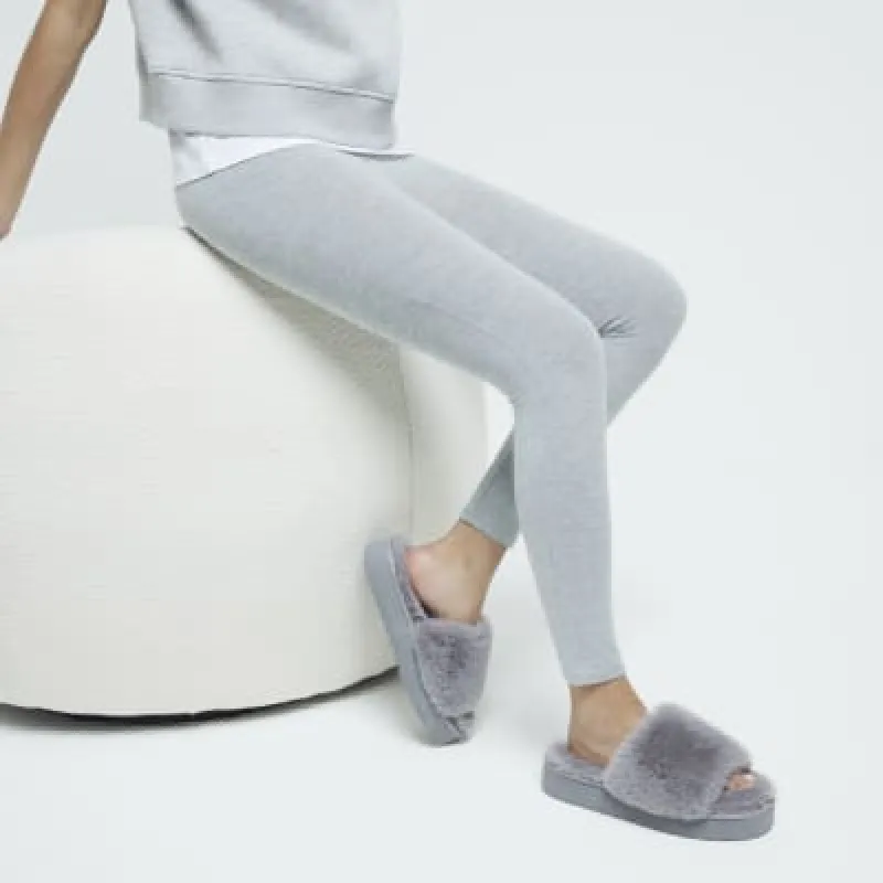 Grey faux fur open toe platform slippers sold by River Island