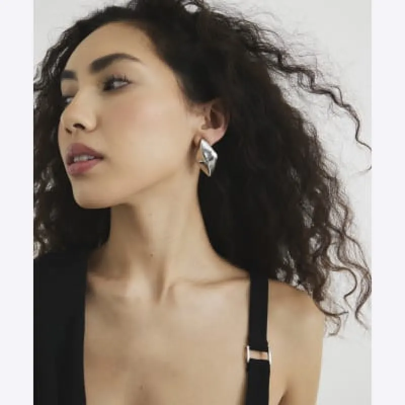 Silver Diamond Wave Stud Earrings sold by River Island