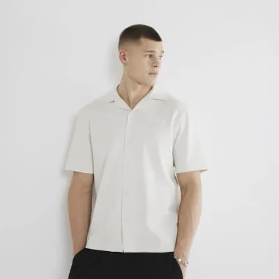 Beige Regular Fit Jacquard Polo Shirt sold by River Island