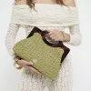 Green raffia clutch bag sold by River Island