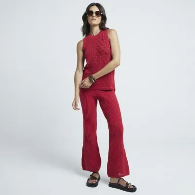 Red crochet tank top sold by River Island