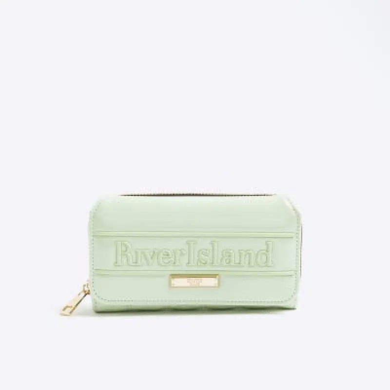 Green Embossed Flap Zip Around Purse sold by River Island