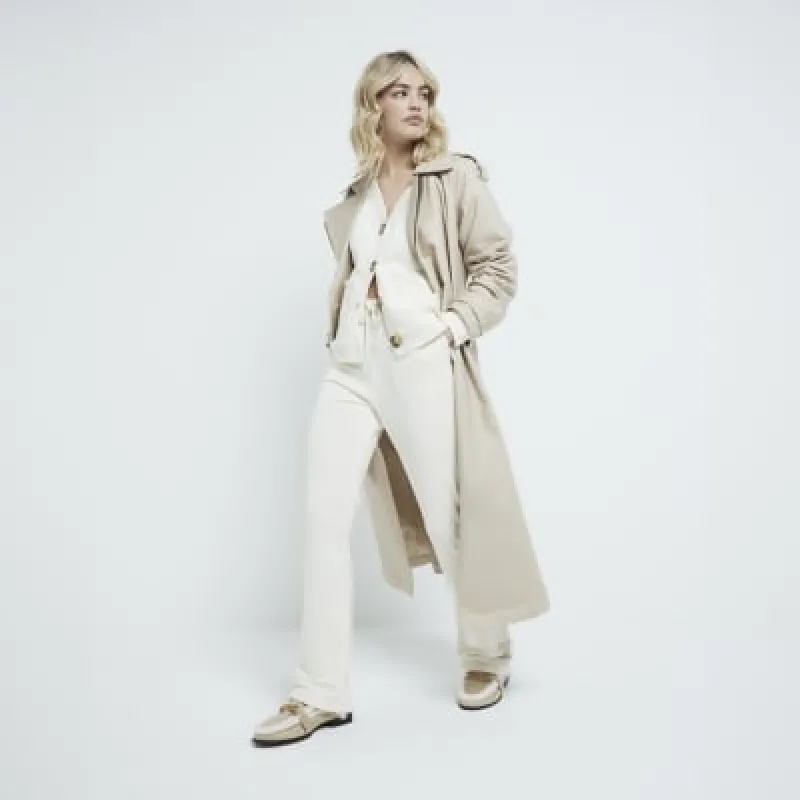 Cream Bootcut joggers sold by River Island