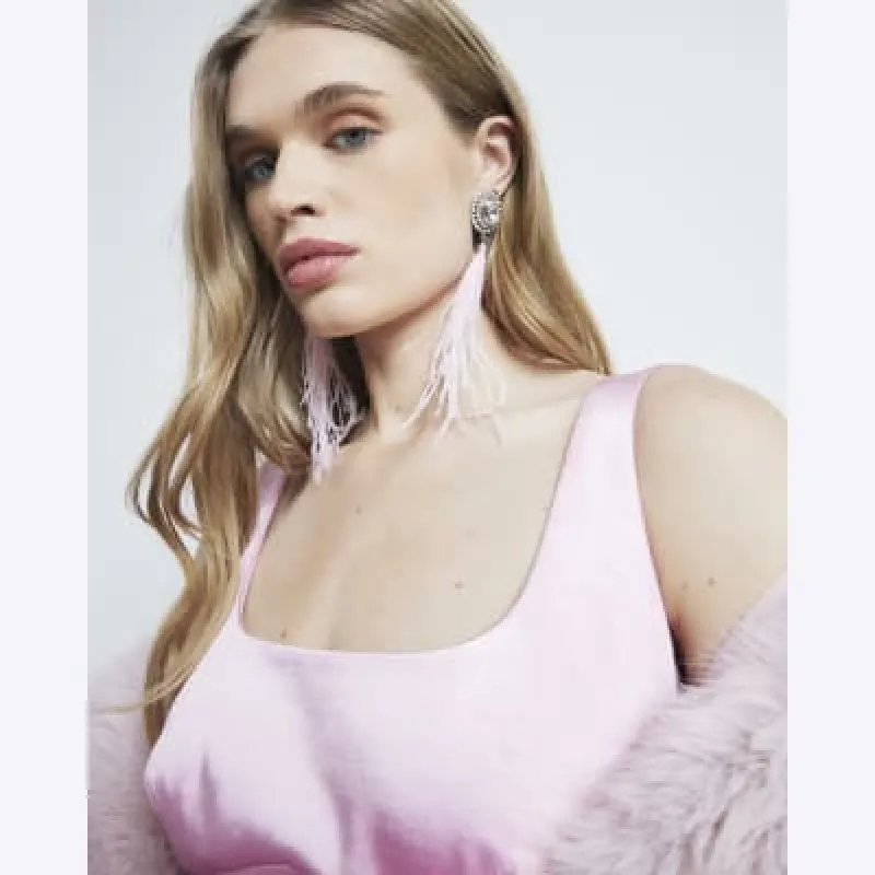 Pink Feather Drop Earrings sold by River Island