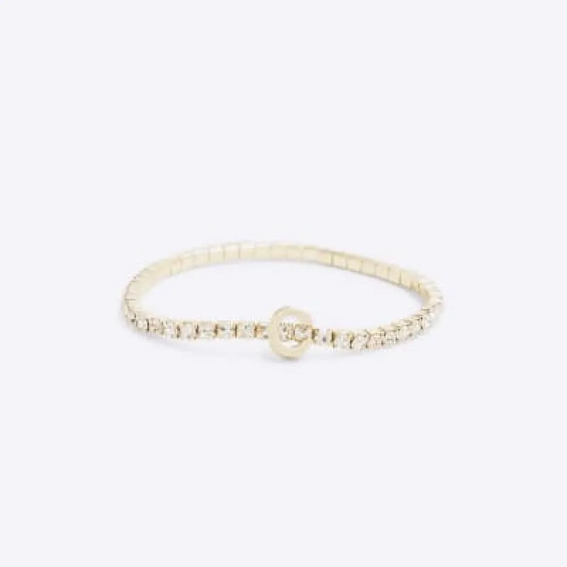 Gold Initial C Bracelet sold by River Island