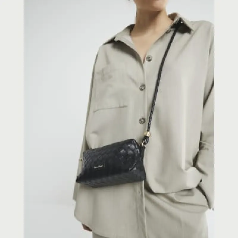 Black Faux Leather Weave Cross Body Bag sold by River Island