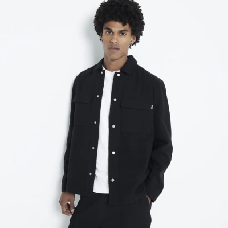 Black regular fit popper fastening shacket sold by River Island