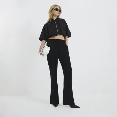 Black Tailored Elastic back Joggers sold by River Island