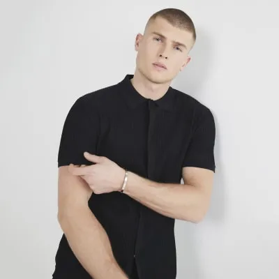 Black muscle fit brick pointelle shirt sold by River Island