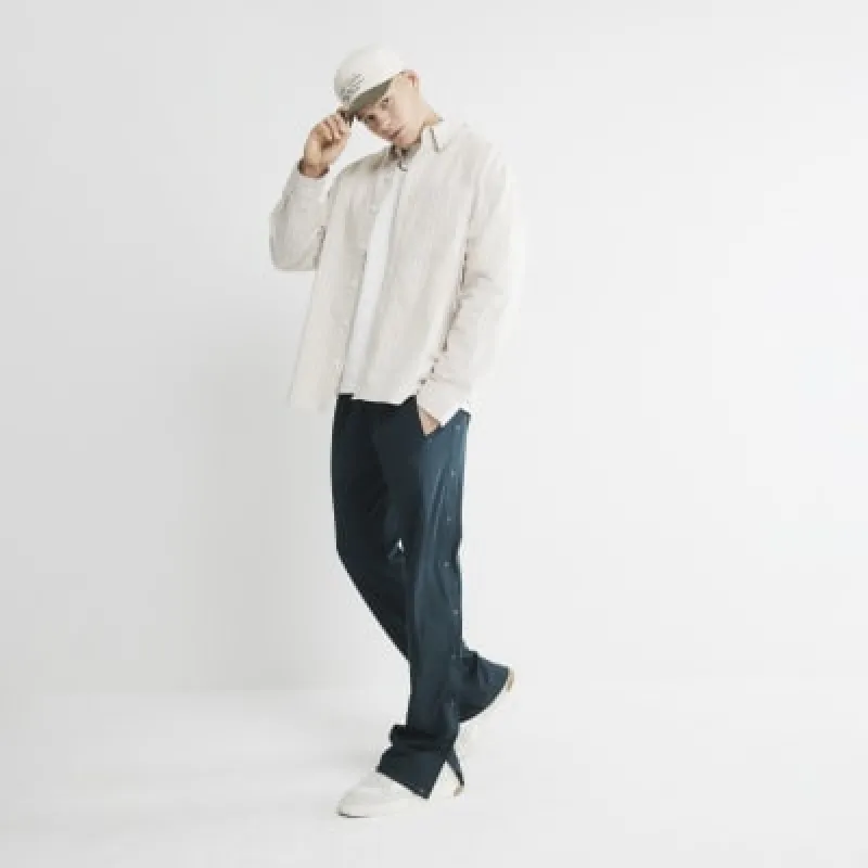 Green Open Hem Popped Joggers sold by River Island