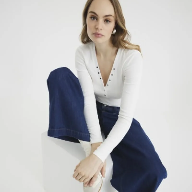 White Ribbed Long Sleeve Popper Top sold by River Island