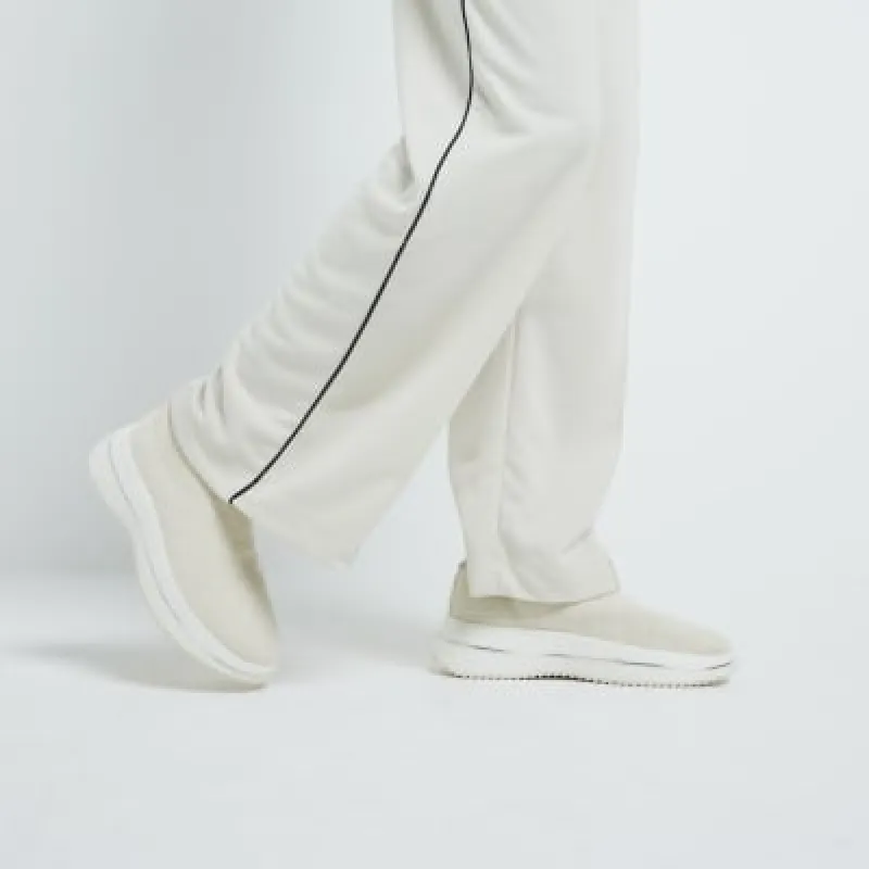 Cream knit laceless slip on shoes sold by River Island