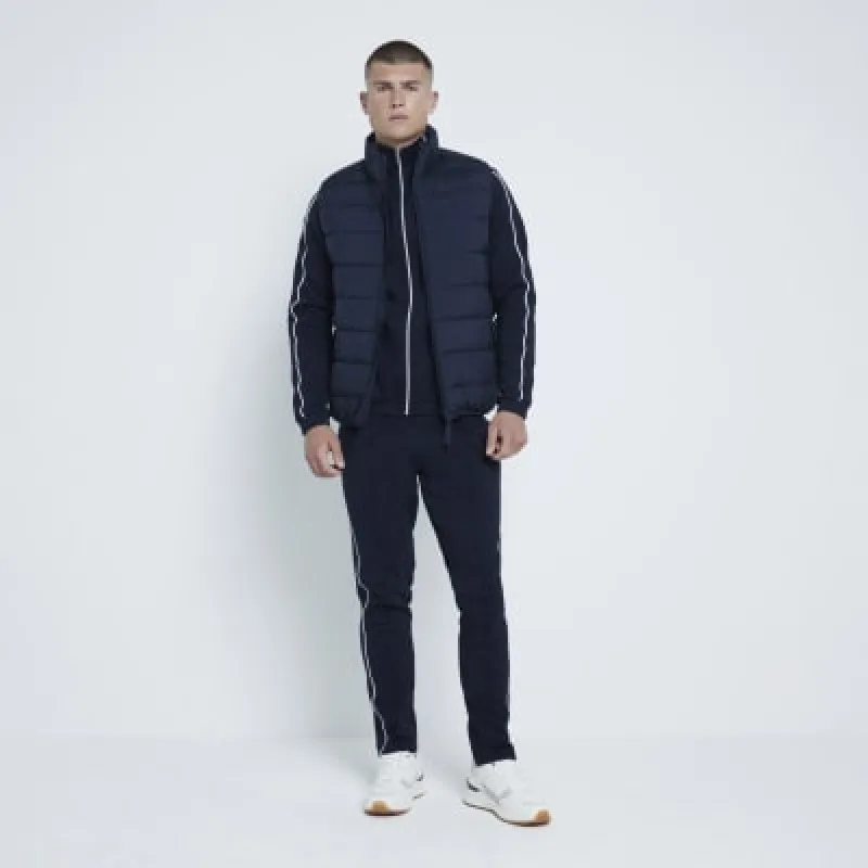 Navy Skinny Fit Piped Joggers sold by River Island