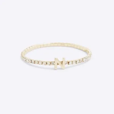 Gold Initial N Bracelet sold by River Island