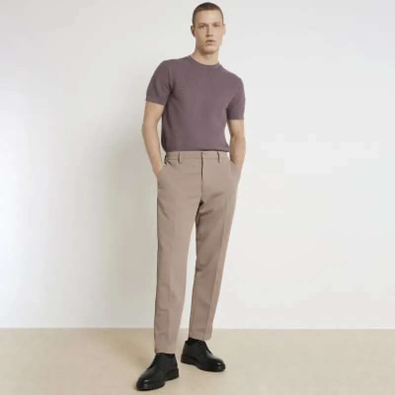 Beige slim fit waffle textured smart trousers sold by River Island