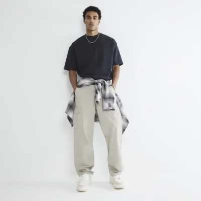 Stone Loose Fit Cargo Trousers sold by River Island