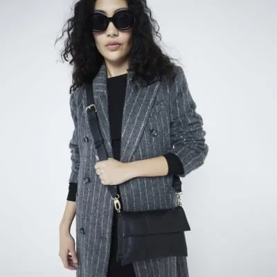 Black Leather Flap Cross Body Bag sold by River Island